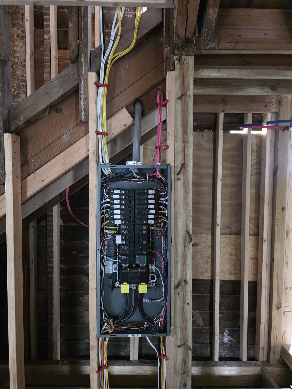 Panel rough-in during framing stage